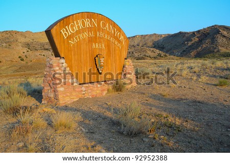 Bighorn Canyon National Recreation Area sign at sunset