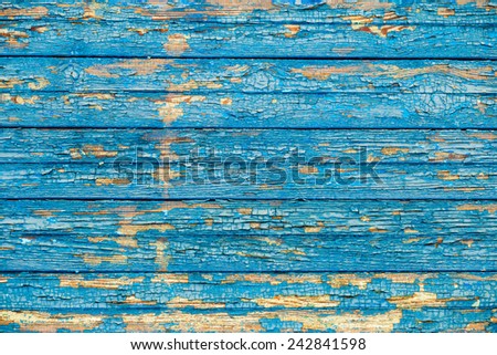 old wood texture with a shabby blue paint front
