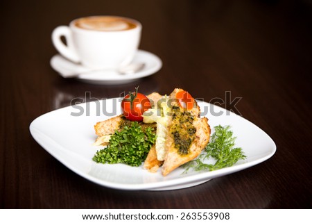 vegetarian sandwich and coffee on wooden background