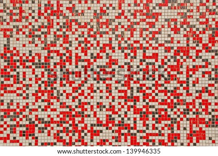 Mosaic made of red, black and white tiles