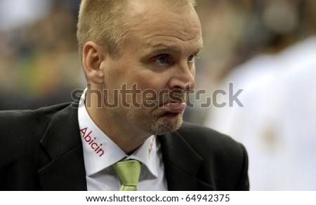 MINSK, BELARUS - OCTOBER 19: Pekka Salminen - head coach of BC Honka watches the game with BC Minsk-2006 in VTB United League game on October 19, 2010 in Minsk, Belarus
