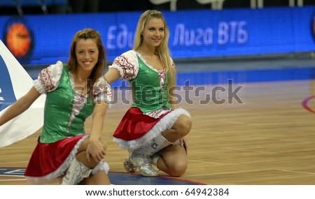 stock-photo-minsk-belarus-october-girls-from-team-support-entertains-people-on-game-bc-minsk-vs-bc-64942384.jpg