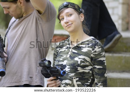 ZASLAWYE, BELARUS - MAY 17: Player with gun during Laser Tag IT-CUP tournament at abandoned summer camp on May 17, 2014 in Zaslawye, Belarus.