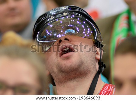 MINSK, BELARUS - MAY 19: Fan looks on during 2014 IIHF World Ice Hockey Championship match at Minsk Arena on May 19, 2014 in Minsk, Belarus.