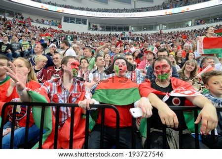 MINSK, BELARUS - MAY 19: Fans of Belarus during 2014 IIHF World Ice Hockey Championship match on May 19, 2014 in Minsk, Belarus.