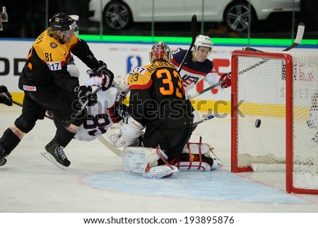 MINSK, BELARUS - MAY 20: AUS den BIRKEN Danny of Germany and ANKERT Torsten of Germany miss the puck during 2014 IIHF World Ice Hockey Championship match on May 20, 2014 in Minsk, Belarus