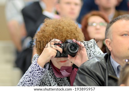 MINSK, BELARUS - MAY 20: Fan of Latvia makes the shot during 2014 IIHF World Ice Hockey Championship match on May 20, 2014 in Minsk, Belarus