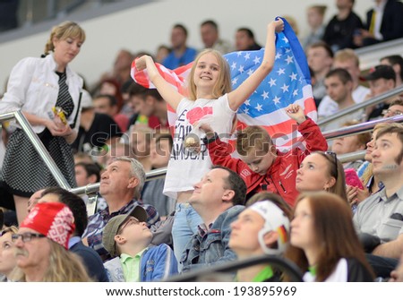 MINSK, BELARUS - MAY 20: Fans of USA celebrate during 2014 IIHF World Ice Hockey Championship match on May 20, 2014 in Minsk, Belarus