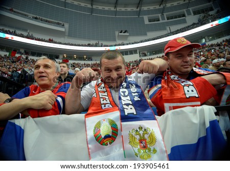 MINSK, BELARUS - MAY 20: Fans of Russia and Belarus during 2014 IIHF World Ice Hockey Championship match on May 20, 2014 in Minsk, Belarus.