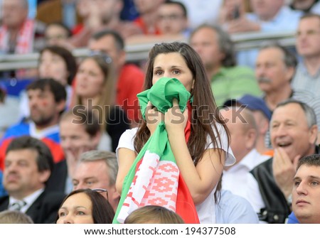 MINSK, BELARUS - MAY 22: Fans of Belarus looks dejected during 2014 IIHF World Ice Hockey Championship quarterfinal match on May 22, 2014 in Minsk, Belarus.