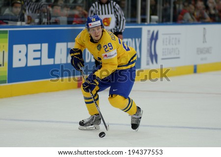 MINSK, BELARUS - MAY 22: GUSTAFSSON Erik of Sweden skates with the puck during 2014 IIHF World Ice Hockey Championship quarterfinal match on May 22, 2014 in Minsk, Belarus.