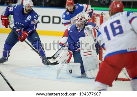 MINSK, BELARUS - MAY 22: HUET Cristobal of France saves the puck during 2014 IIHF World Ice Hockey Championship quarterfinal match on May 22, 2014 in Minsk, Belarus.