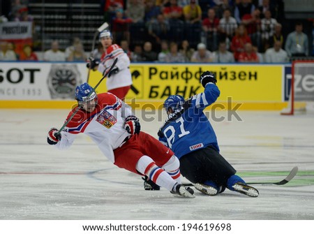 MINSK, BELARUS - MAY 24: ZATOVIC Martin(26) of Czech Republic and PAKARINEN Iiro (81) of Finland during 2014 IIHF World Ice Hockey Championship semifinal match on May 24, 2014 in Minsk, Belarus.