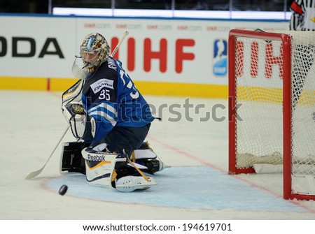 MINSK, BELARUS - MAY 24: RINNE Pekka (35) of Finland looks on the puck during 2014 IIHF World Ice Hockey Championship semifinal match at Minsk Arena on May 24, 2014 in Minsk, Belarus.