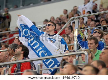 MINSK, BELARUS - MAY 24: Fans of Finland celebrates during 2014 IIHF World Ice Hockey Championship semifinal match at Minsk Arena on May 24, 2014 in Minsk, Belarus.
