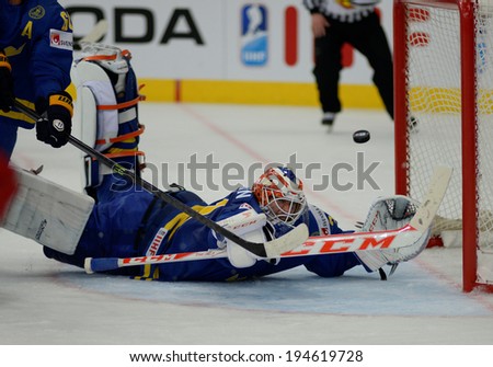 MINSK, BELARUS - MAY 24: NILSSON Anders(31) of Sweden looks on the puck during 2014 IIHF World Ice Hockey Championship semifinal match at Minsk Arena on May 24, 2014 in Minsk, Belarus.