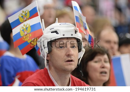 MINSK, BELARUS - MAY 24: Fans of Russia during 2014 IIHF World Ice Hockey Championship semifinal match at Minsk Arena on May 24, 2014 in Minsk, Belarus.
