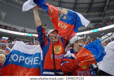 MINSK, BELARUS - MAY 25: Fans of Russia celebrates during 2014 IIHF World Ice Hockey Championship final at Minsk Arena