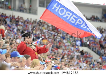 MINSK, BELARUS - MAY 25: Fans of Russia celebrates during 2014 IIHF World Ice Hockey Championship final at Minsk Arena