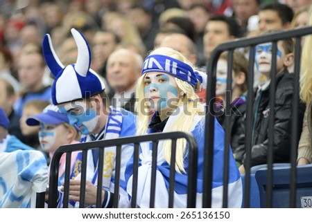MINSK, BELARUS - MAY 16: Fans of Finland during 2014 IIHF World Ice Hockey Championship match at Minsk Arena on May 16, 2014 in Minsk, Belarus.