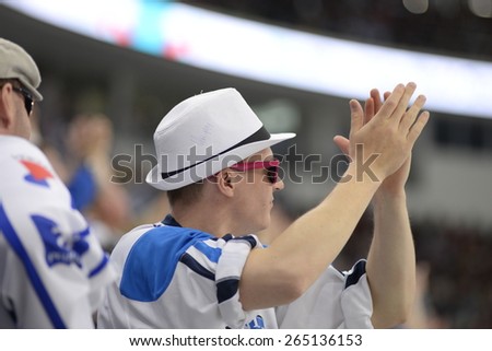 MINSK, BELARUS - MAY 16: Fans of Finland celebrate during 2014 IIHF World Ice Hockey Championship match at Minsk Arena on May 16, 2014 in Minsk, Belarus.