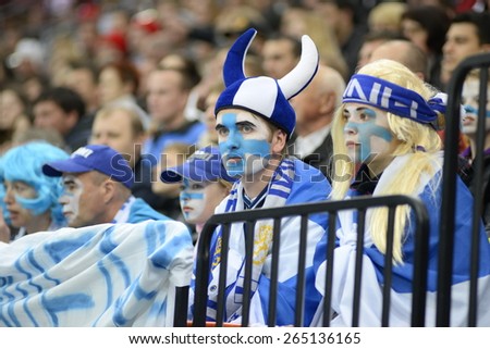 MINSK, BELARUS - MAY 16: Fans of Finland during 2014 IIHF World Ice Hockey Championship match at Minsk Arena on May 16, 2014 in Minsk, Belarus.