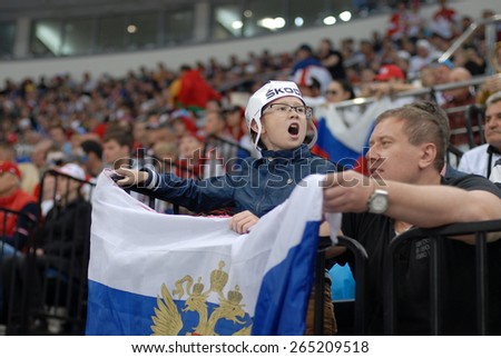 MINSK, BELARUS - MAY 17: Fans of Russia during 2014 IIHF World Ice Hockey Championship match at Minsk Arena on May 17, 2014 in Minsk, Belarus.