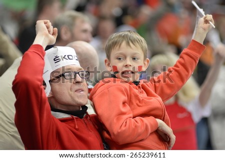MINSK, BELARUS - MAY 17: Fans of Belarus during 2014 IIHF World Ice Hockey Championship match at Minsk Arena on May 17, 2014 in Minsk, Belarus.