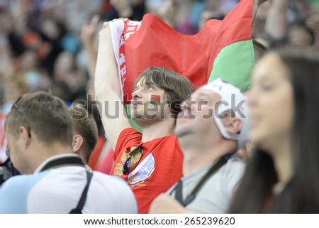 MINSK, BELARUS - MAY 17: Fans of Belarus during 2014 IIHF World Ice Hockey Championship match at Minsk Arena on May 17, 2014 in Minsk, Belarus.