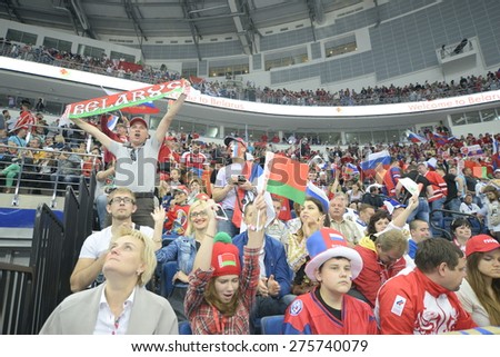 MINSK, BELARUS - MAY 20: Fans of Russia and Belarus during 2014 IIHF World Ice Hockey Championship match at Minsk Arena on May 20, 2014 in Minsk, Belarus.