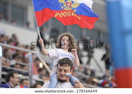 MINSK, BELARUS - MAY 24: Fans of Russia during 2014 IIHF World Ice Hockey Championship match at Minsk Arena on May 24, 2014 in Minsk, Belarus.