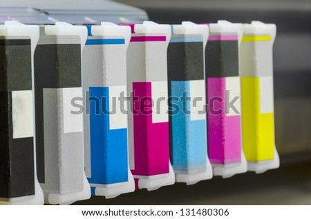 large format ink jet printer cartridge with paper roll closeup