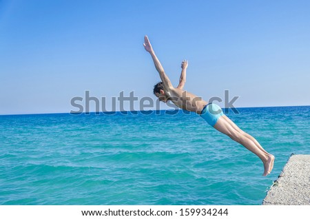 water jump in the blue sea