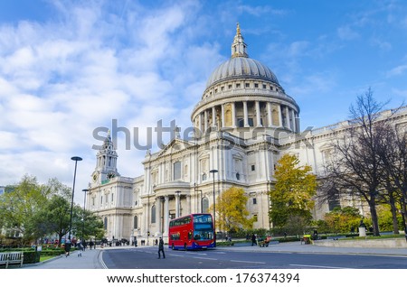 St. Pauls Cathedral With Red Double Decker Bus In London, United Kingdom