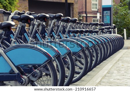 City Bike Rental - Stock Image, a row of bikes for hire as part of a new scheme to encourage \