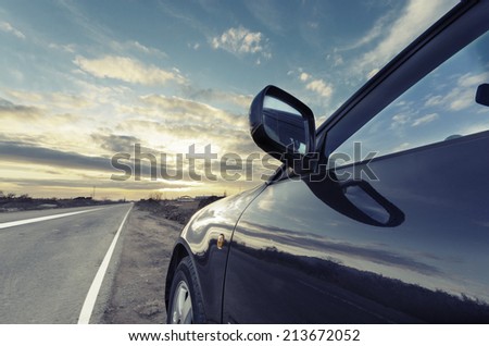 Sport car ride on road in sunset weather VINTAGE