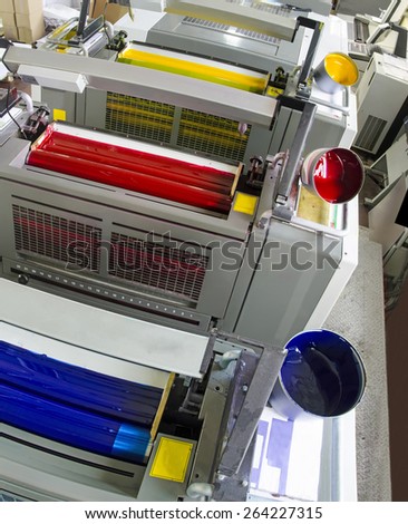 printing machine cylinders and printing ink pot with cyan red yellow color