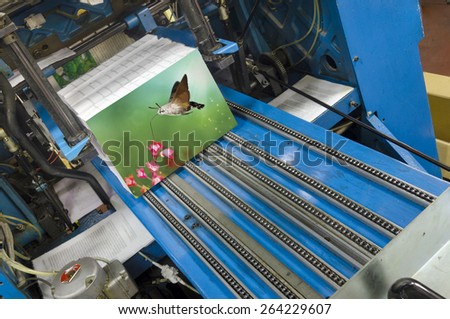 Book production line in modern print house wide shot