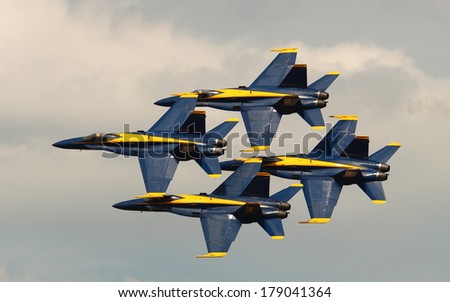 VIRGINIA BEACH, VA - May 17:US Navy Blue Angels in F-18 Hornet planes perform in air show routine in Va beach, VA on May 17, 2010. Blue Angels are the oldest active aerobatic team in the world