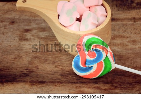 pink marshmallows and candy sweet valentine on wood vintage