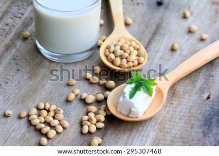 Soybeans and soy milk on wood vintage