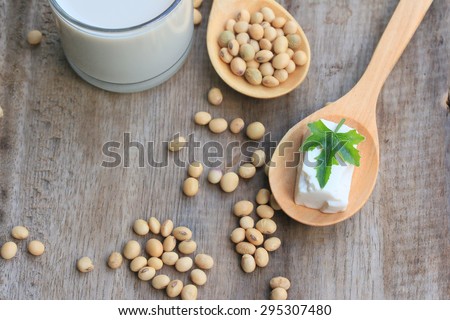 Soybeans and soy milk on wood vintage