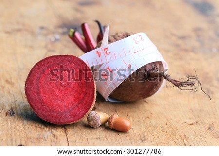 fresh vegetables beetroot and tape measure