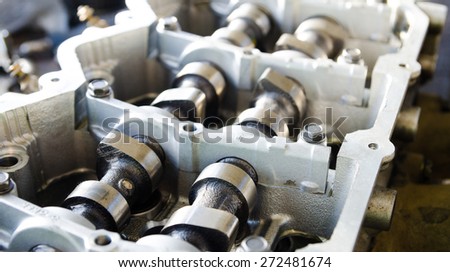 Open engine block exposing the pistons and crankshaft in a service