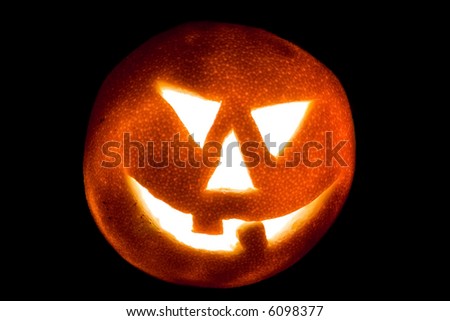 Pumpkin for a holiday Halloween, made of an orange.