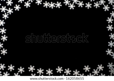 Frame made of ice crystals as design element for winter, christmas, New Year\'s images.