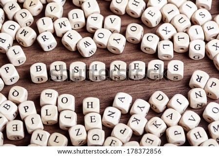 Text concept macro: Letter dices forming word 