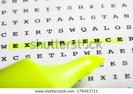Puzzle, riddle letter grid with text marker - word Experience marked in yellow.