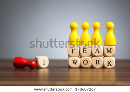Concept toy pawn figures There is no I in teamwork Concept toy pawn figures There is no I in teamwork
