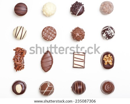 Variety of chocolate truffles, pralines, isolated on white background.